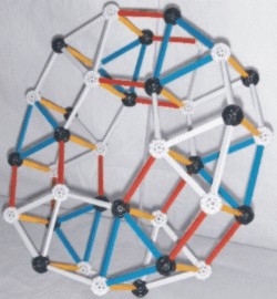 ZOME model of the carbon12 nucleus frpm the left

the three alpha-1 bond are show with red struts
                              and 
the three alpha-2 bond are show with white struts 