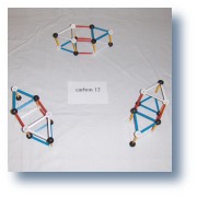 Three alpha particles starting
to come together to form carbon